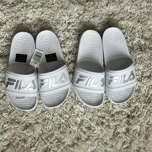 Unisex Fila slides ( 2 pair ) sold together.